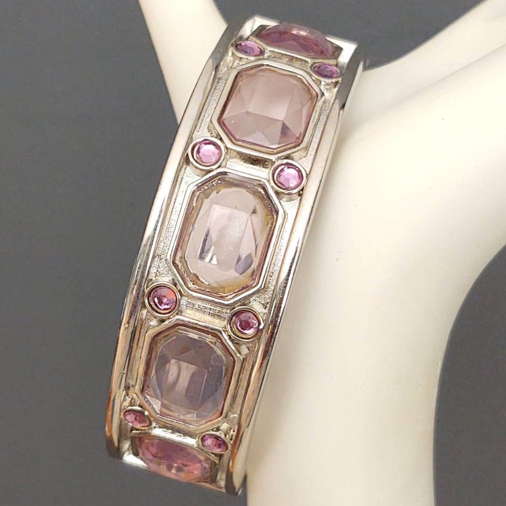 Silver hinge closure bangle with purple beads